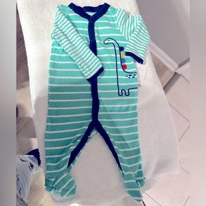 Brand new with tags Carter’s Dinosaur Footie pajamas